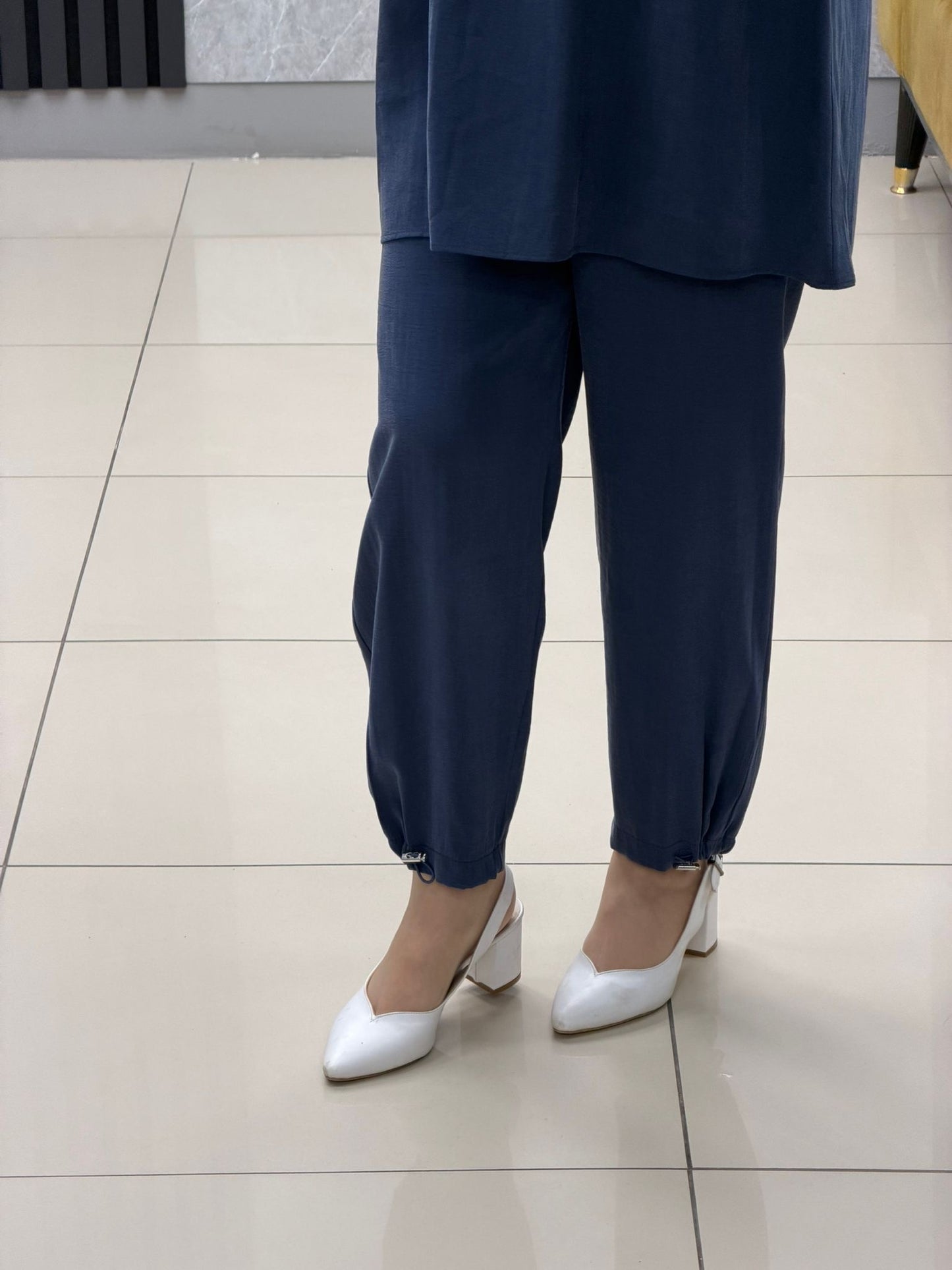 Noshe paçası lastikli ipek kupra pantolon 4640