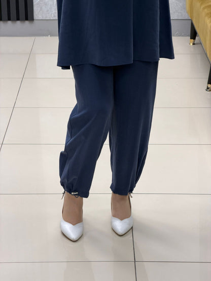 Noshe paçası lastikli ipek kupra pantolon 4640
